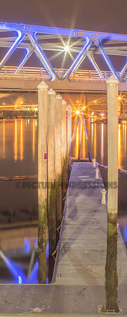 Dock overlooking Memorial Bridge at night Portsmouth, NH