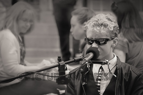 Teenage street musician